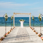 Beach wedding ceremony with starfish at Finest Playa Mujeres