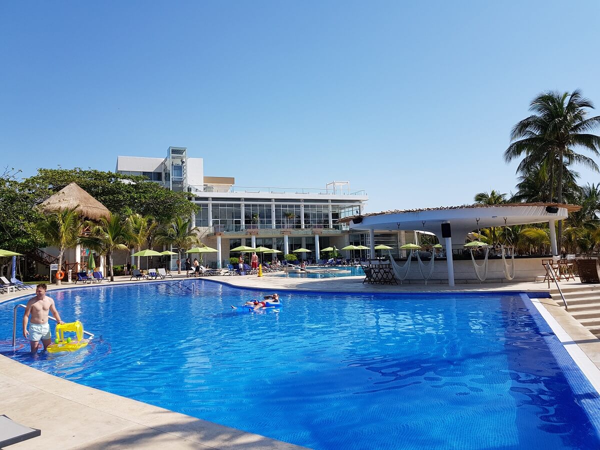 view of the pool and main pool bar