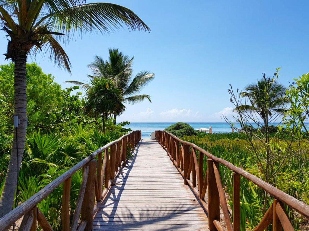 bridge to the beach of an an-inclusive resort in the riviera maya