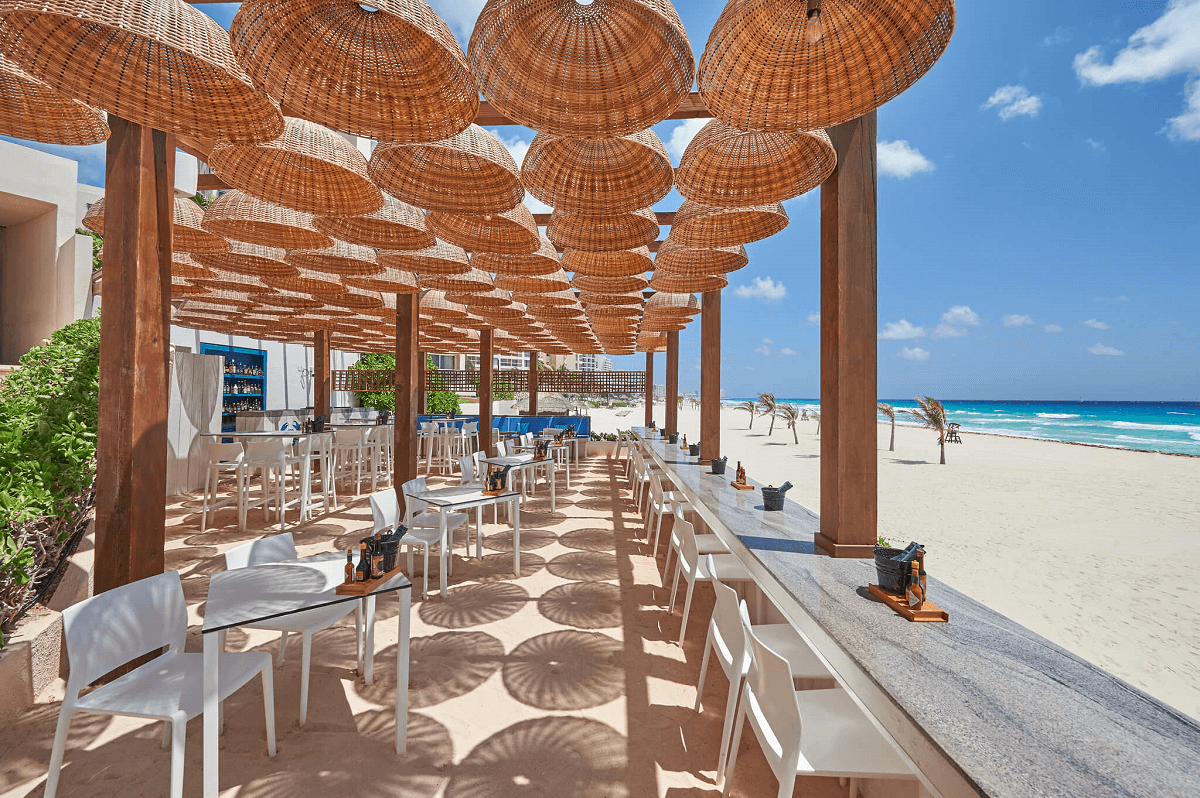 Beachfront restaurant with basket lamps