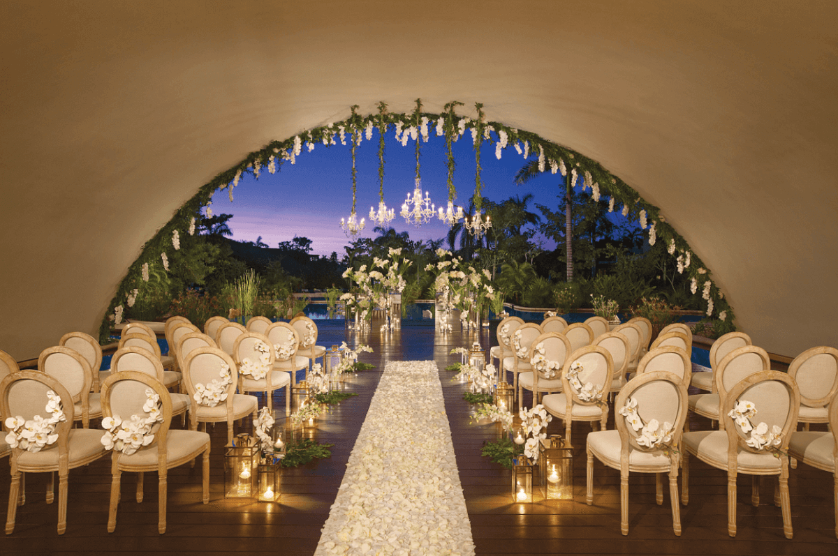 Arch arranged with wedding decor and white flowers