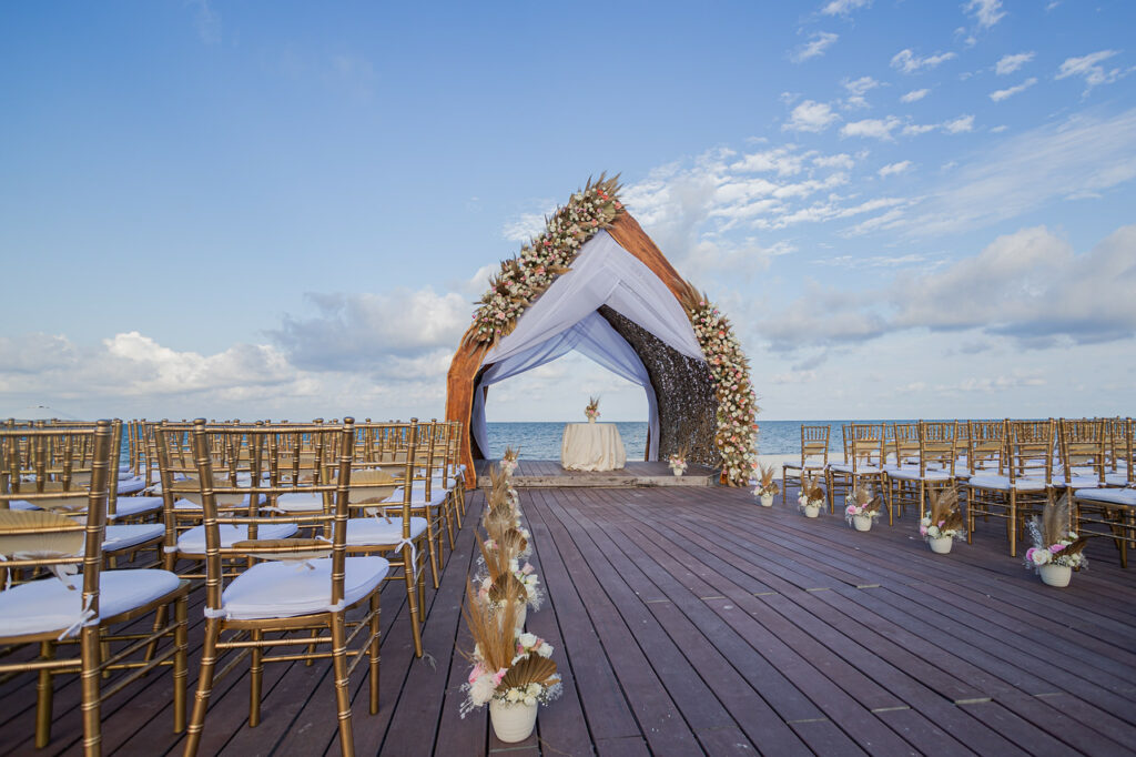 Oceanfront wedding gazebo filled with flowers