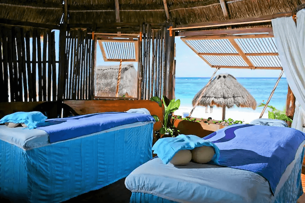Oceanfront palapa with massage beds
