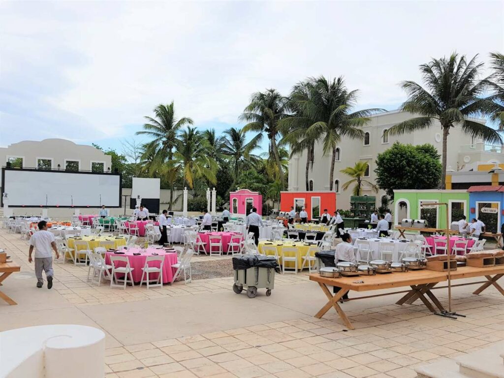 Mexican-style Plaza with colorful architecture being set for an event