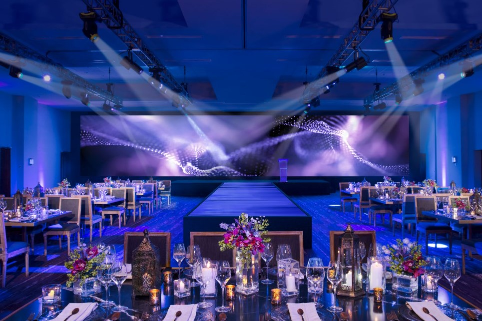 Resort ballroom set for a wedding dinner