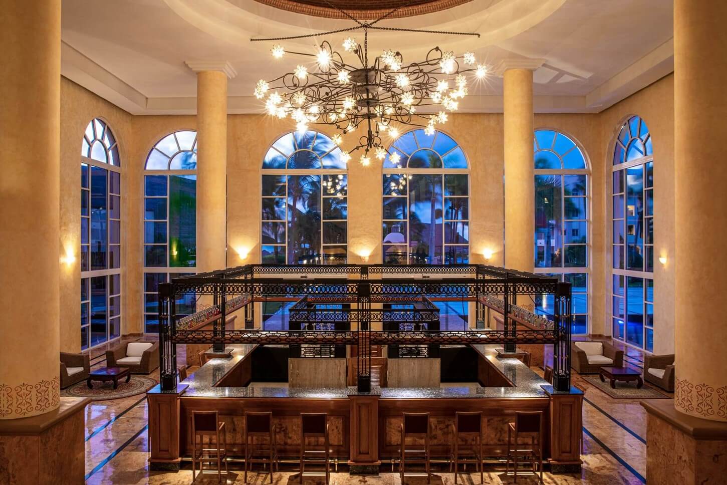 Lobby bar with big windows and stars chandeliers