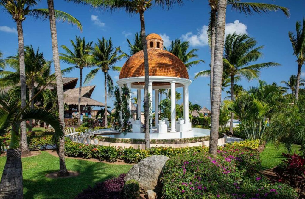 Wedding gazebo with brick dome surrounded by tropical gardens