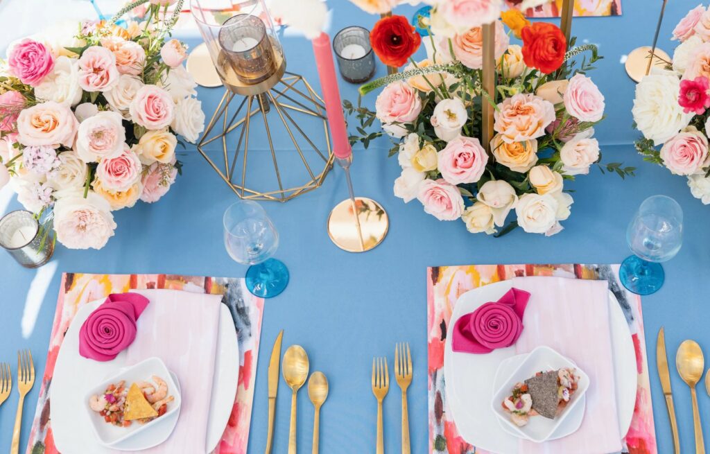 Wedding set up in pastel colors and golden silver ware
