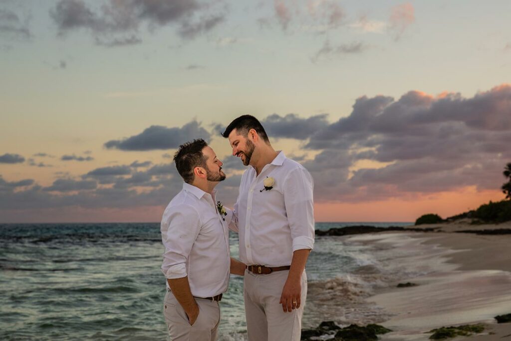 Same sex wedding coupleat the beach