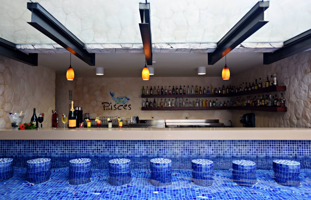 Hotel pool with swim up bar