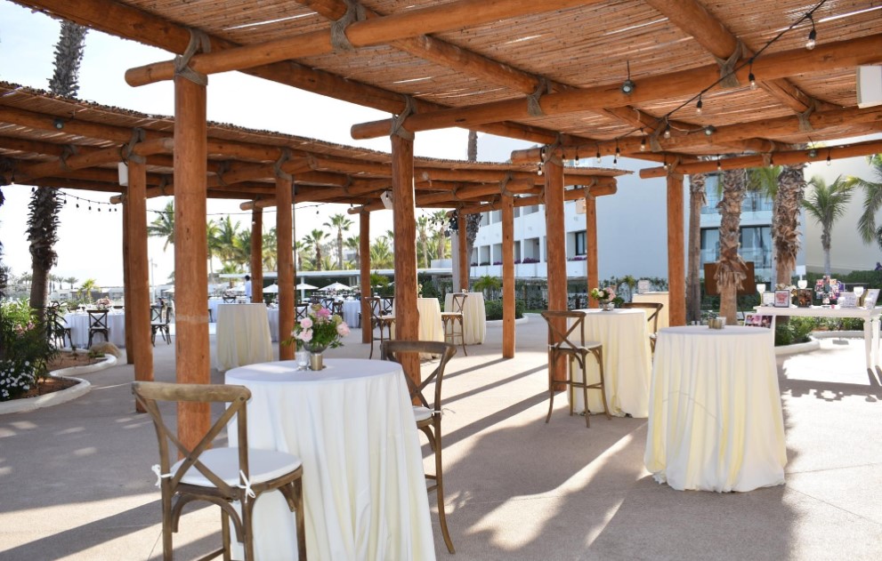 resort terrace wedding with wood ceiling and vintage style furniture