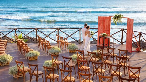 couple getting married at the terrace overlooking the ocean