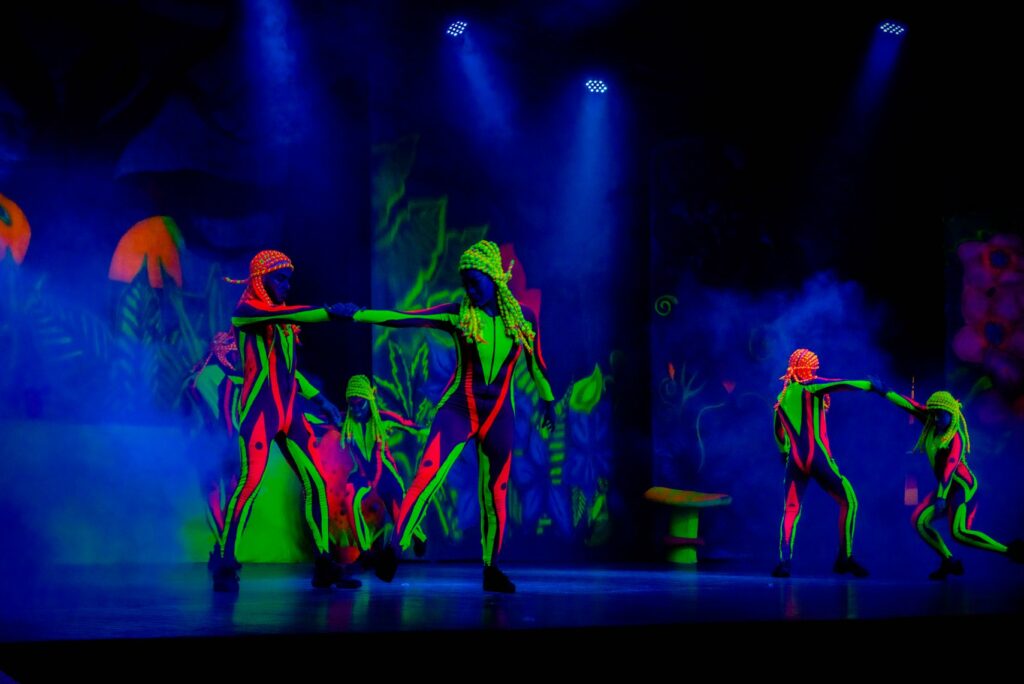 Neon glow show at a resort theatre