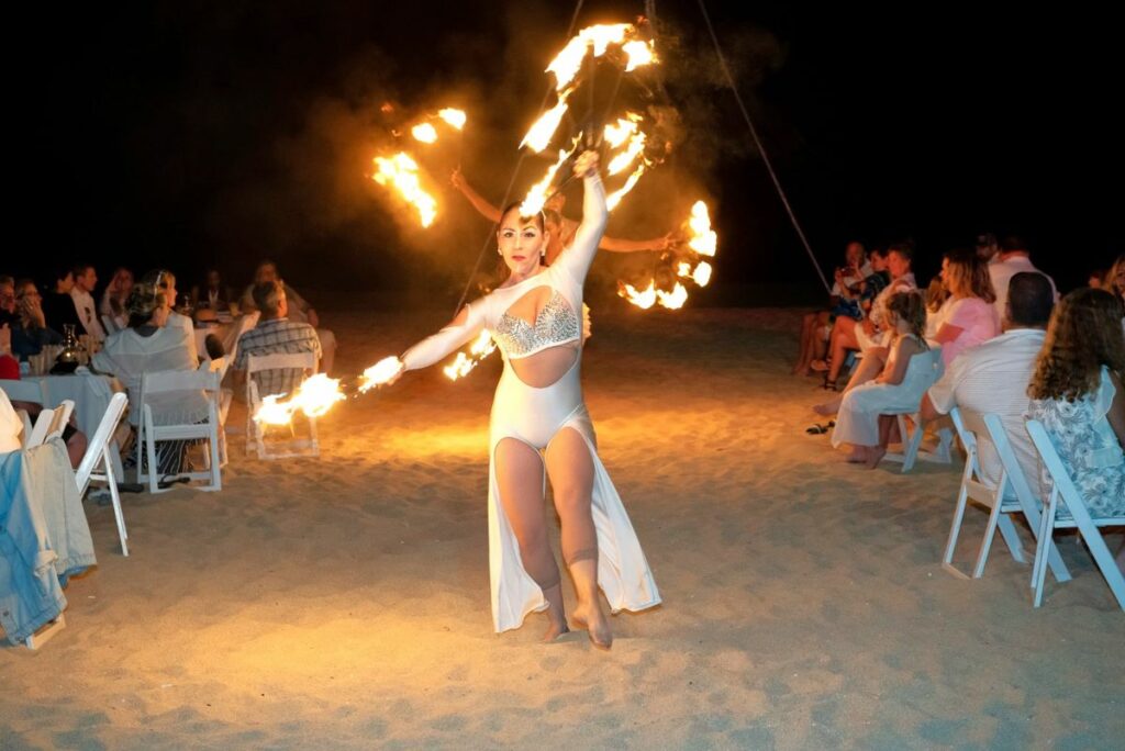beach party with a fire show
