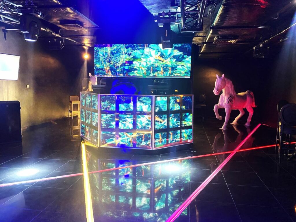 night club with big horses and led light screens