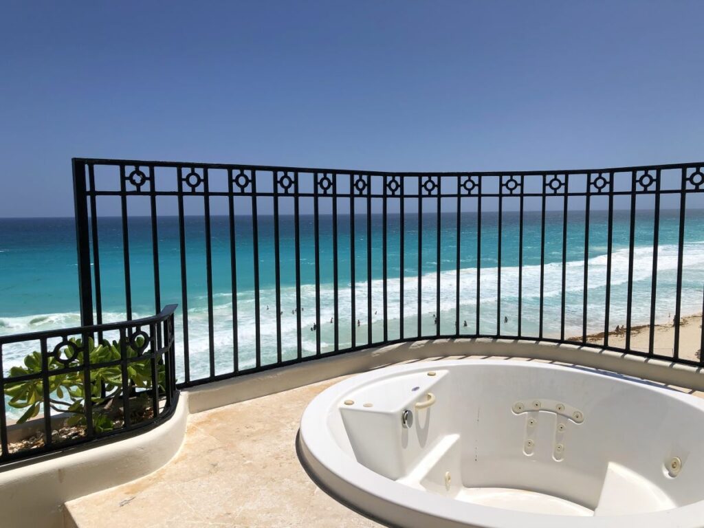 ocean view terrace with a jacuzzi