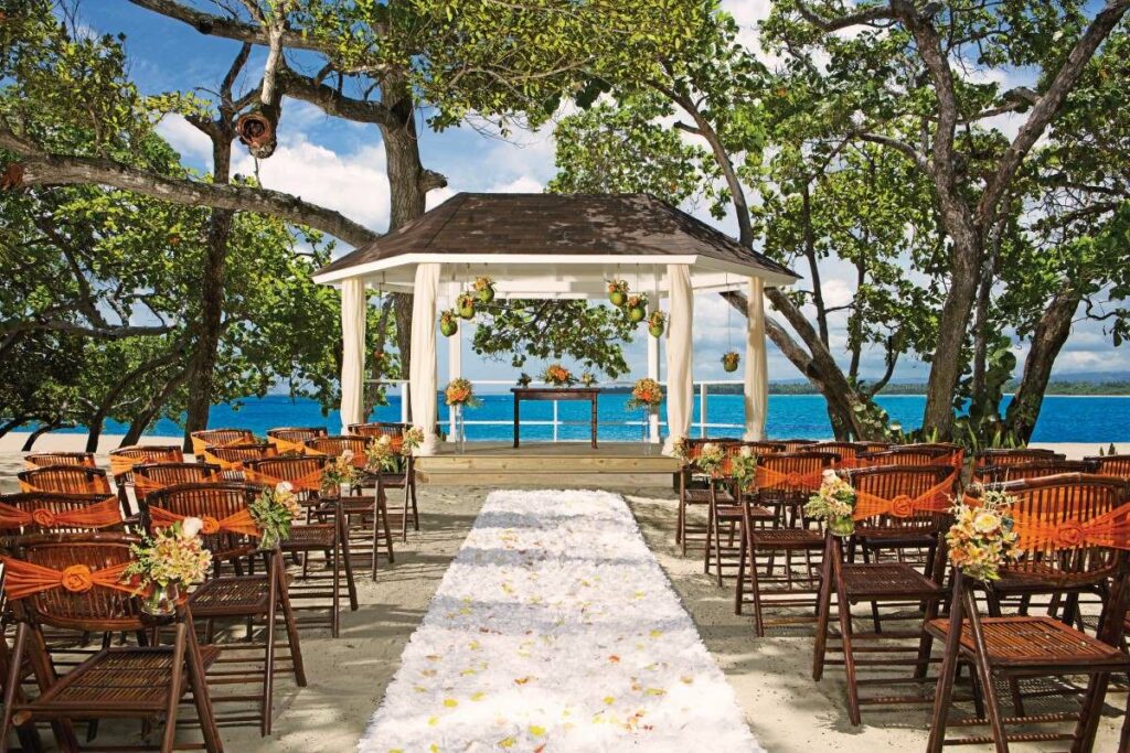 Oceanfront beach wedding gazebo surrounded by trees at sunscape puerto plata resort