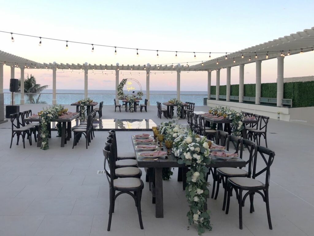 wedding rooftop terrace with a romantic set up and bistro lights