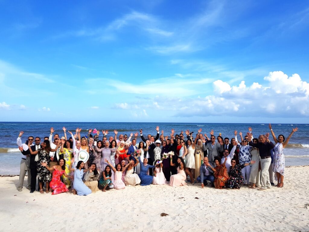 wedding group photo at the beach