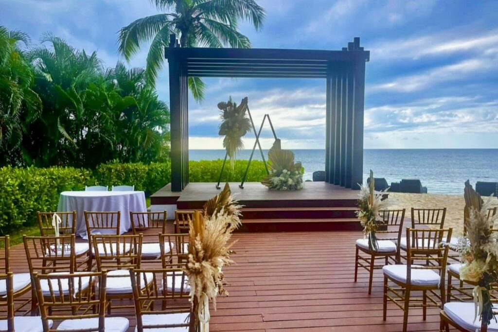 Oceanfront wedding gazebo and deck with a ceremony set up at a resort in montego bay, jamaica