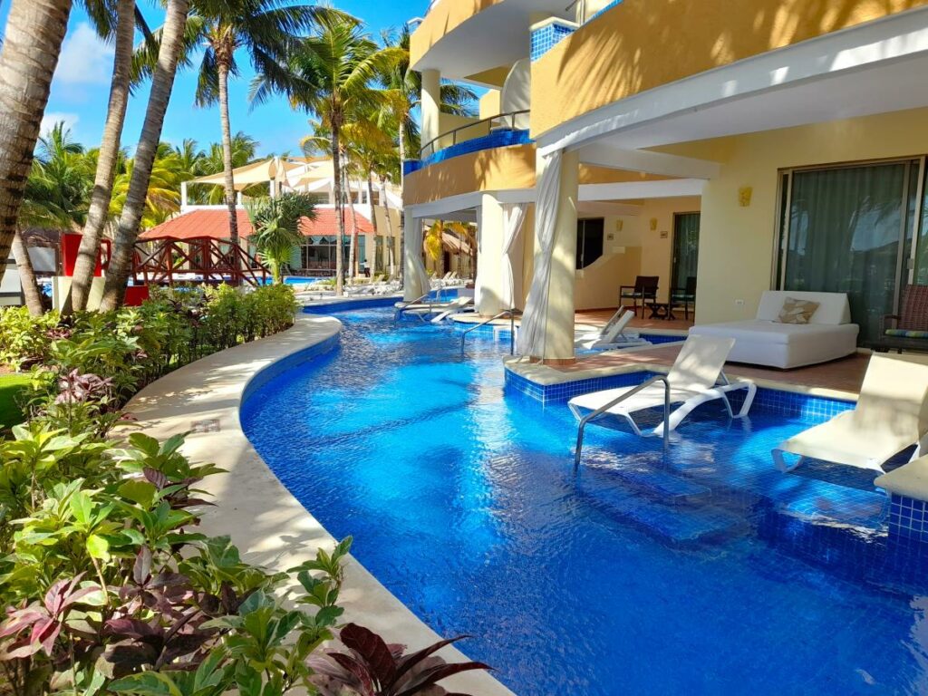 Swim up rooms at a beach resort in the riviera maya