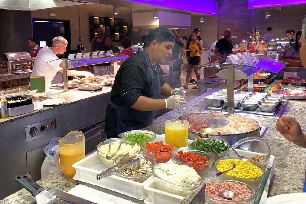 Buffet area with a chef preparing mexican dishes
