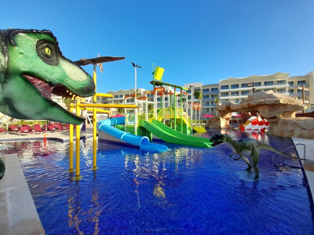 Dinosaur team water park at a beach resort in cancun