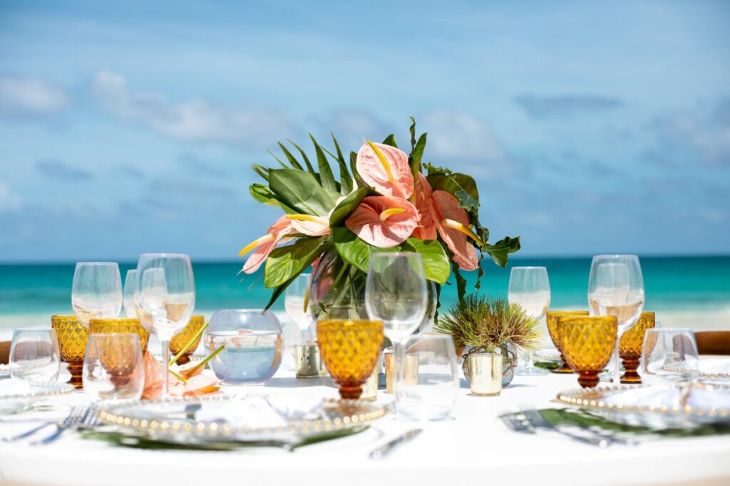 beach wedding reception set up at an all-inclusive resort in mexico