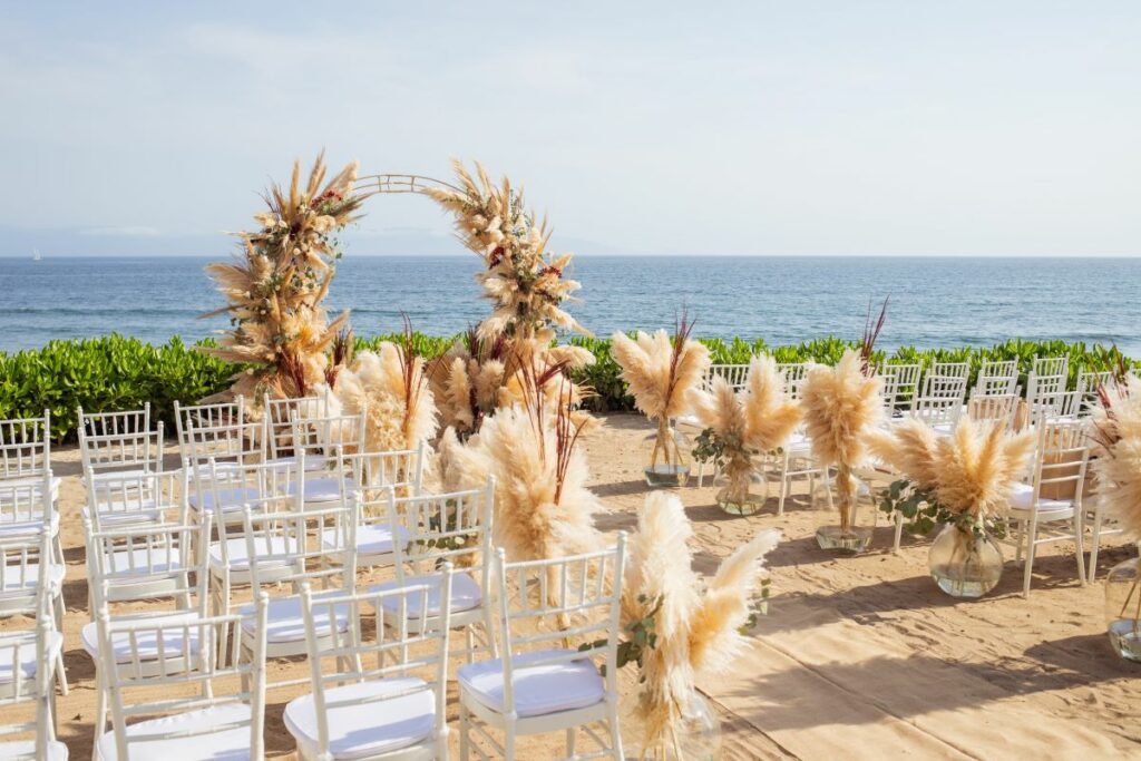 a boho chic wedding ceremony on a beach in puerto vallarta