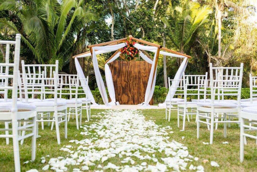 a garden wedding ceremony at secrets bahia mita wedding resort