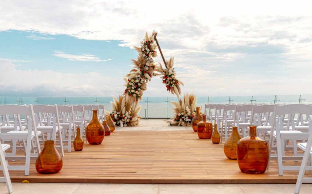 wedding reception at the oceanfront terrace at secrets bahia mita