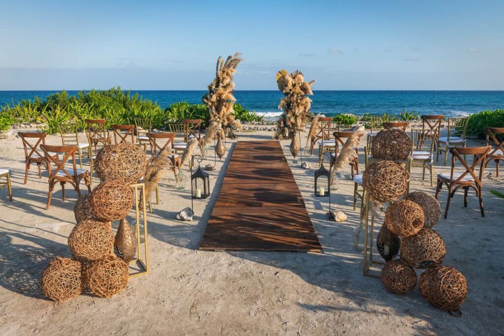 beautiful boho chic beach wedding in a resort in the riviera maya