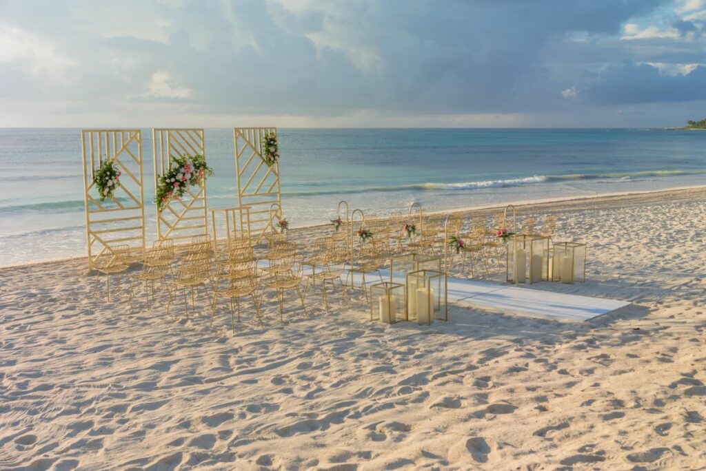 beach wedding set up at unico hotel