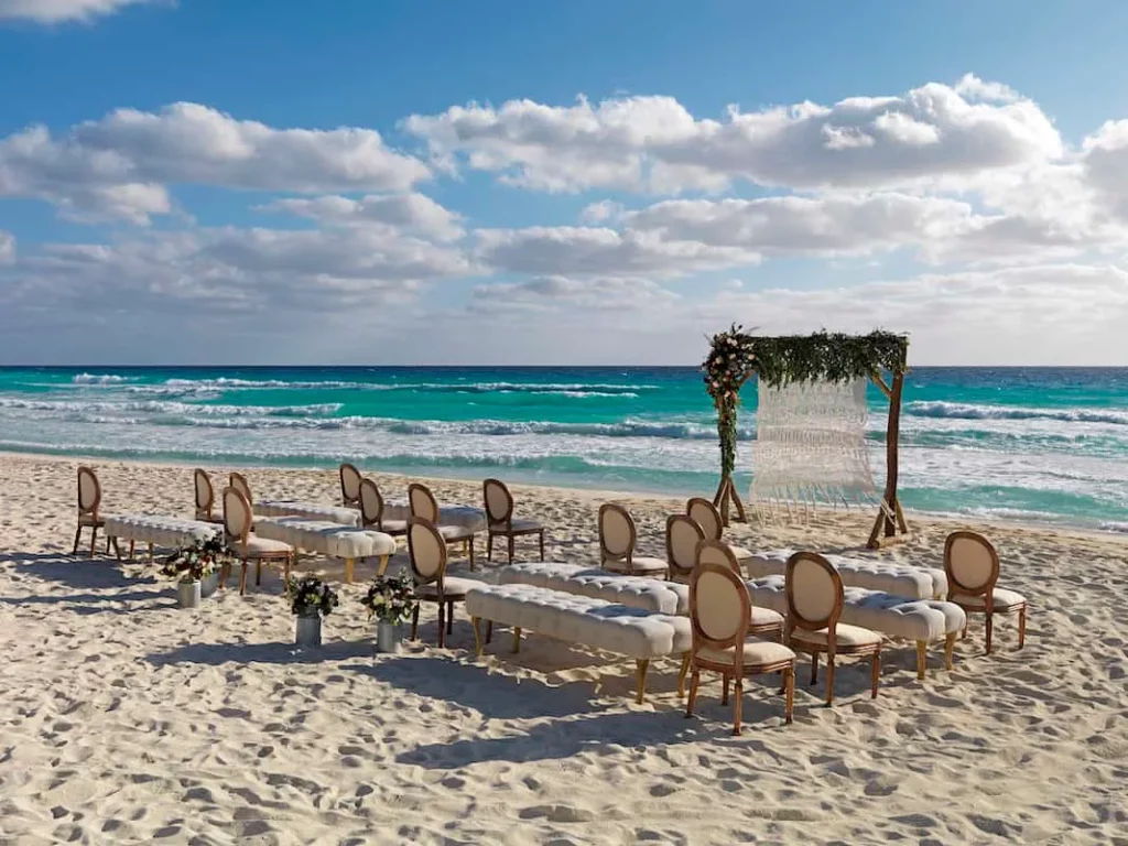 beach wedding ceremony set up at a beach resort in the riviera maya
