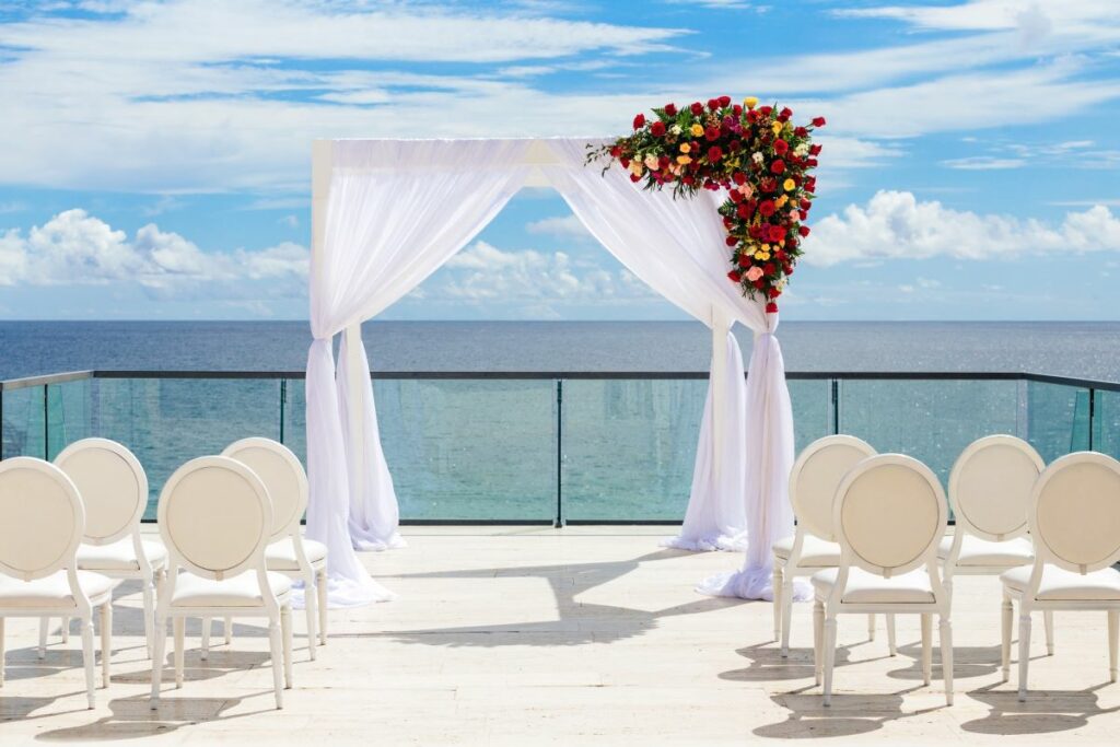 A beach front wedding ceremony at an all-inclusive wedding resort in cabo