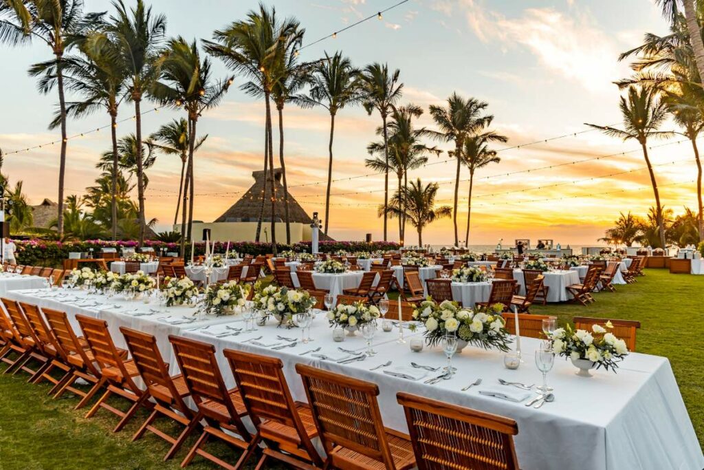 beautiful wedding reception setup in a garden of luxurious grand velas riviera nayaring resort