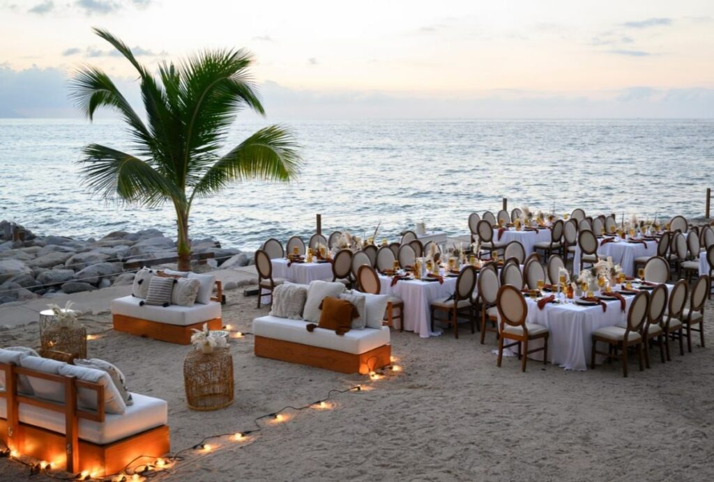 Elegant wedding reception on the beach at an all inclusive resort in puerto vallarta