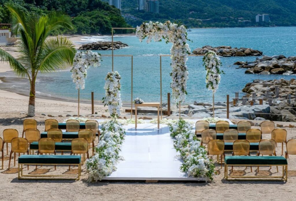 beautiful beach wedding ceremony at a beach resort in puerto vallarta